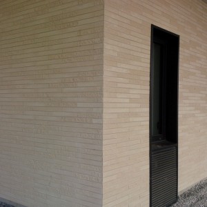 1.800 m² Briques BlocStar Am90 Parement Ton Pierre 2/3 parement lisse et 1/3 parement clivé
