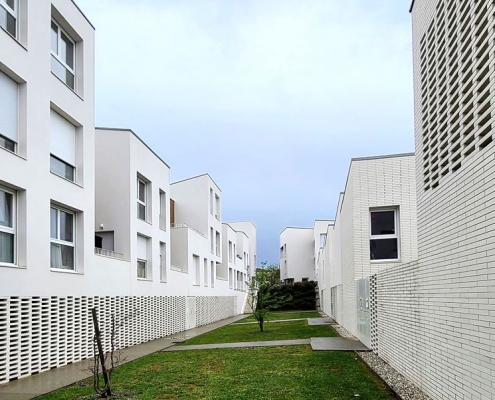 Logement Guesdes à Bègles (33) - Faye Architecte (33) DSA (33) - 700 m² de Briques BlocStar Am90, AmR210 et Plaquettes Ac19 - Moucharabieh