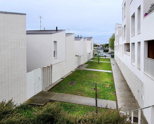 Logement Guesdes à Bègles (33) - Faye Architecte (33) DSA (33) - 700 m² de Briques BlocStar Am90, AmR210 et Plaquettes Ac19 - Moucharabieh