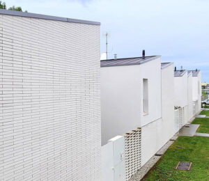 Logement Guesdes à Bègles (33) - Faye Architecte (33) DSA (33) - 700 m² de Briques BlocStar Am90, AmR210 et Plaquettes Ac19 - Moucharabieh
