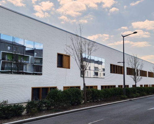 Collège, gymnase à Orléans (45) – Archi5 Prod (93) – 2500m² Briques BlocStar AmR70 Lisses et Clivées