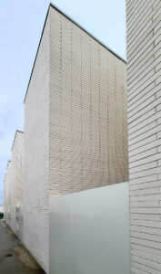 Logement Guesdes à Bègles (33) - Faye Architecte (33) DSA (33) - 700 m² de Briques BlocStar Am90, AmR210 et Plaquettes Ac19 - Moucharabieh